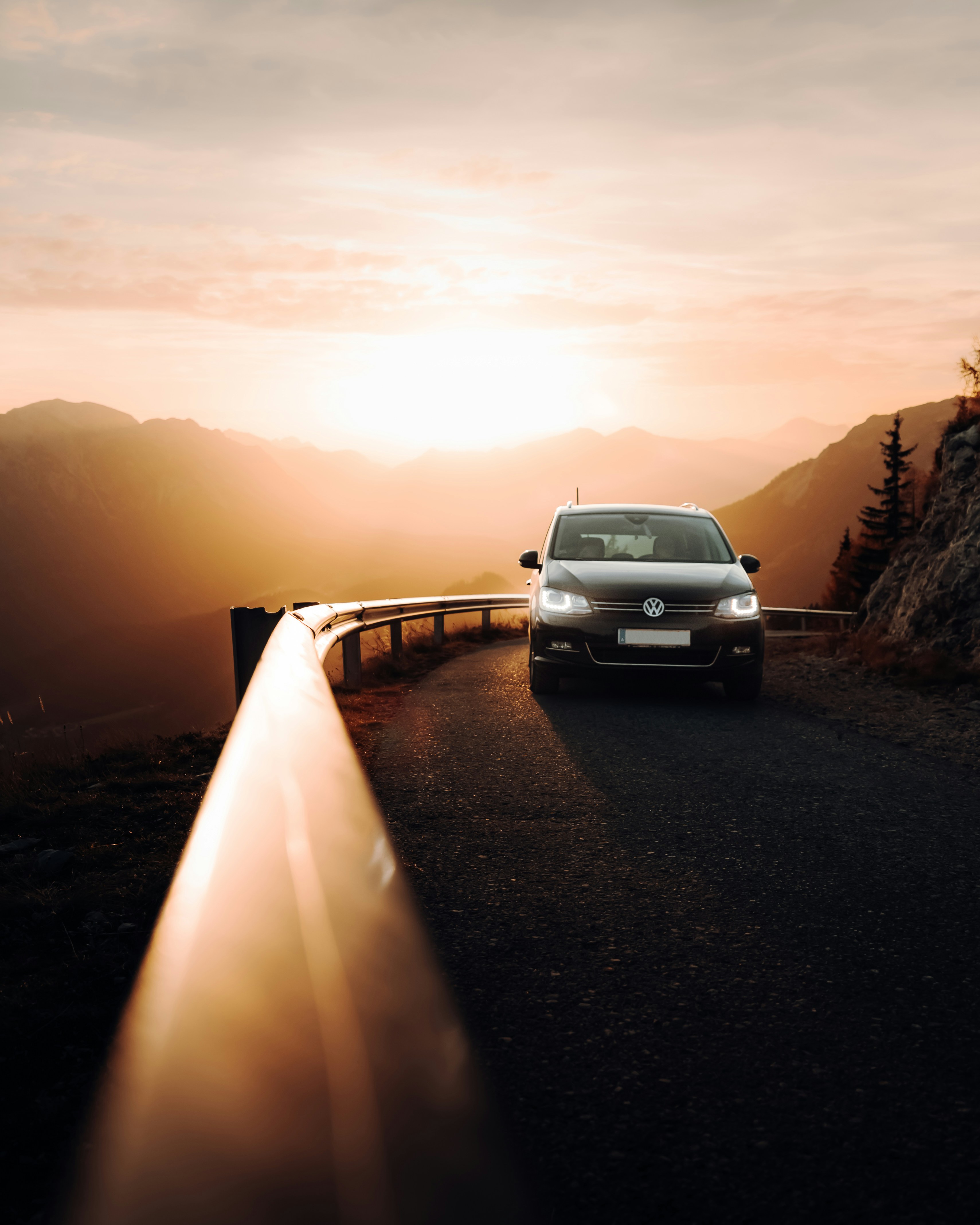 Car driving through modern US landscape illustration